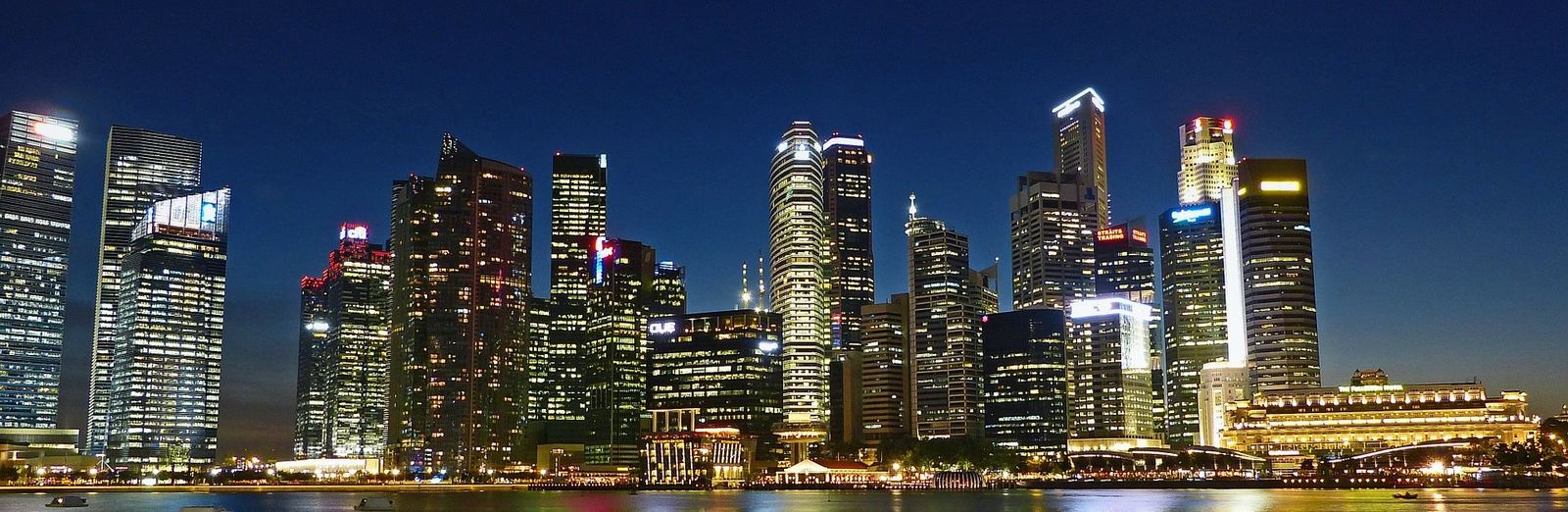 Singapore river skyline at dusk, the site's own 2015 header image